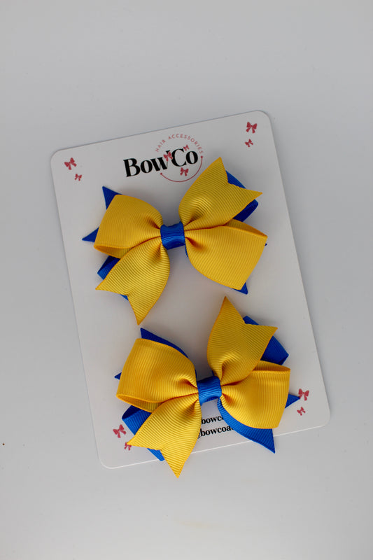 3 Inch Layer Tail Bow - Clip - 2 Pack - Royal Blue and Yellow Gold