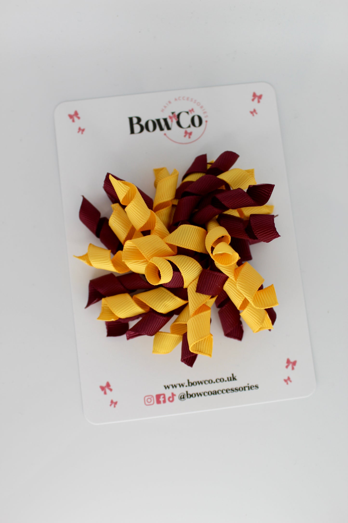 Corker Bow Clip - Burgundy and Yellow Gold